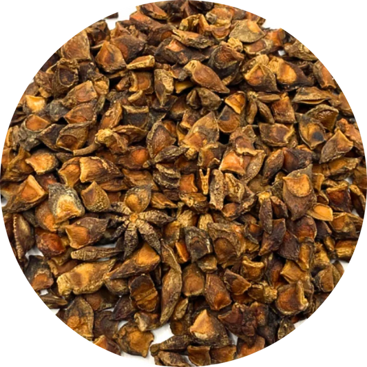 Close-up image of organic broken star anise pieces showing size uniformity, dark brown color, and absence of foreign matter