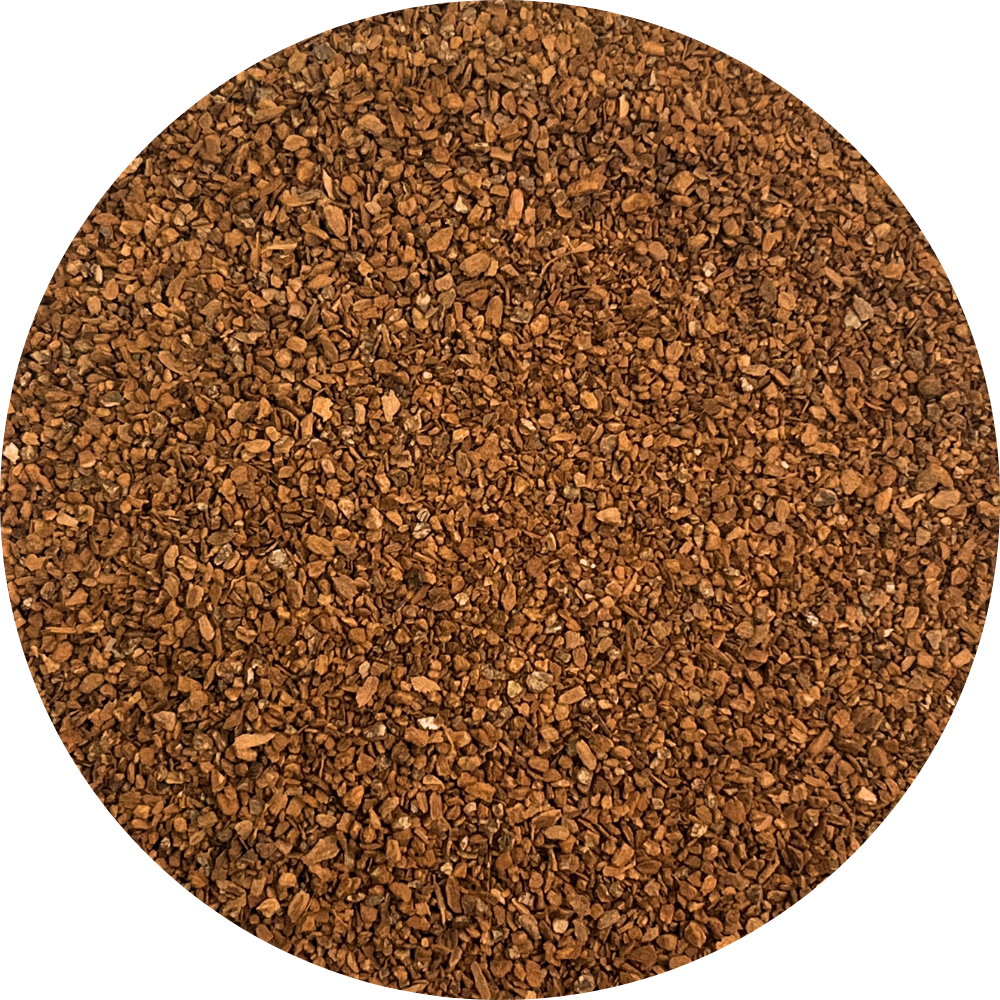 Uniformly milled Viet Haus organic forest cassia cinnamon tea bag cut particles, showing rich reddish-brown color for herbal tea infusion.
