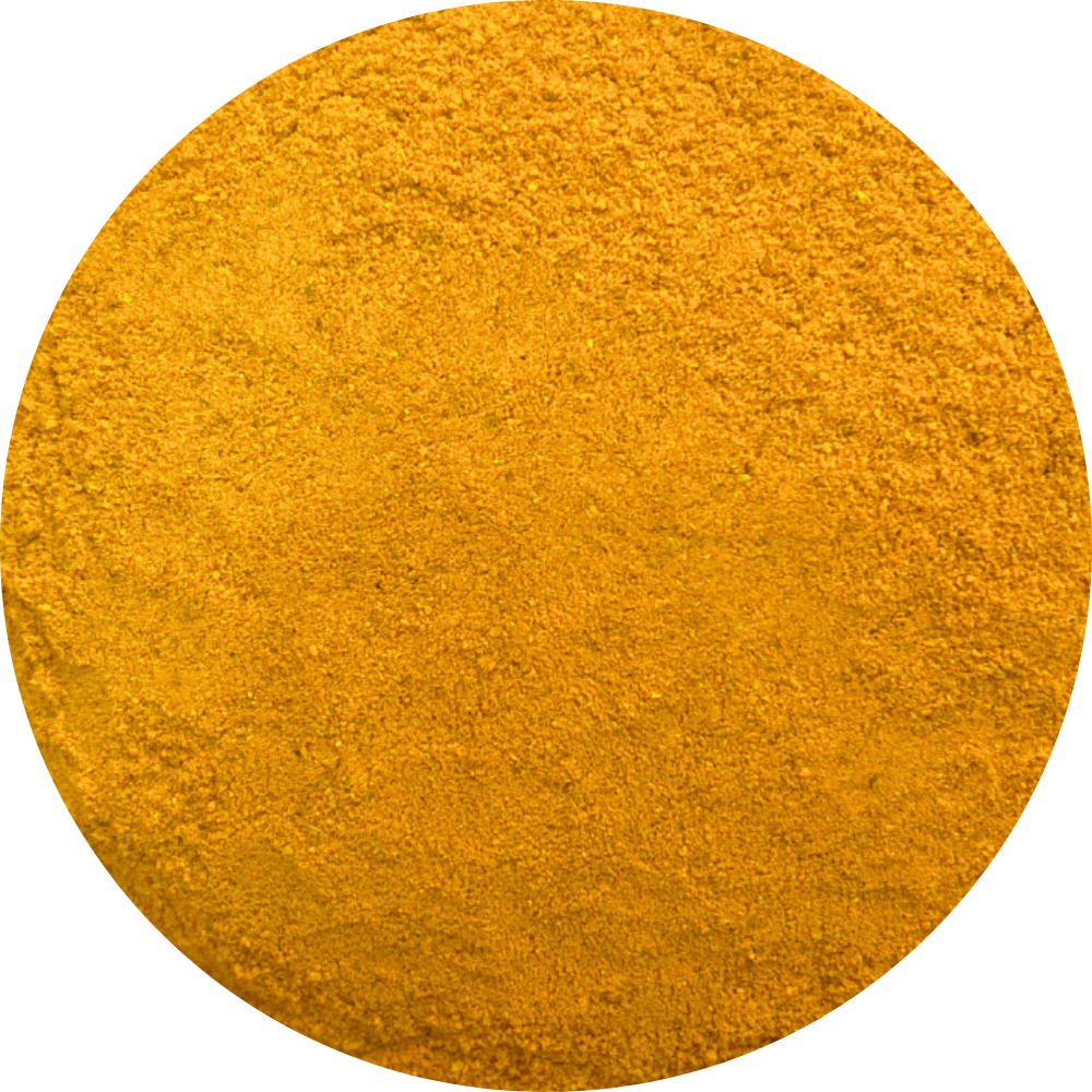 Close-up of organic yellow turmeric powder in a circular frame.