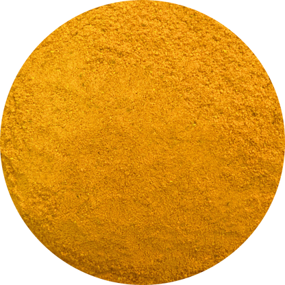 Close-up of organic yellow turmeric powder in a circular frame.