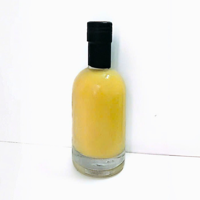 Pure Ginger Juice On A White Background