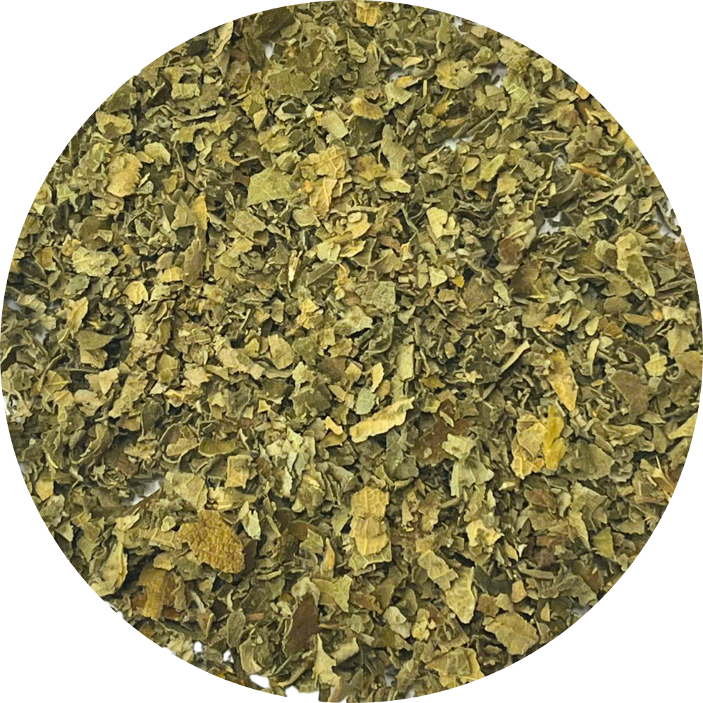 Close-up of dried organic herb flakes and botanical ingredients