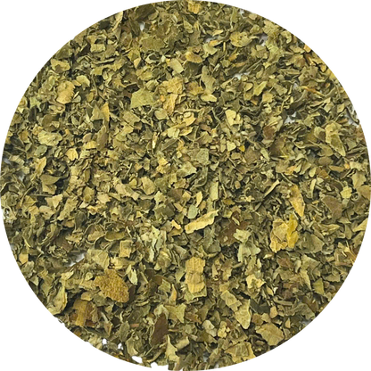 Close-up of dried organic herb flakes and botanical ingredients