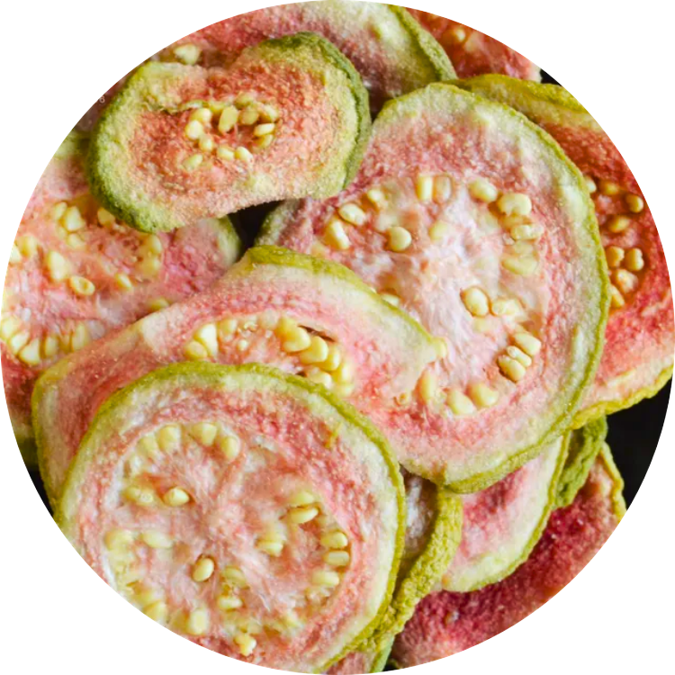 Dried organic guava slices showing the natural green skin and vibrant pink interior flesh