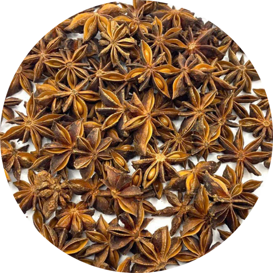 close-up of a whole organic star anise pod, showing the star-shaped husk, textured surface, and intact internal seeds